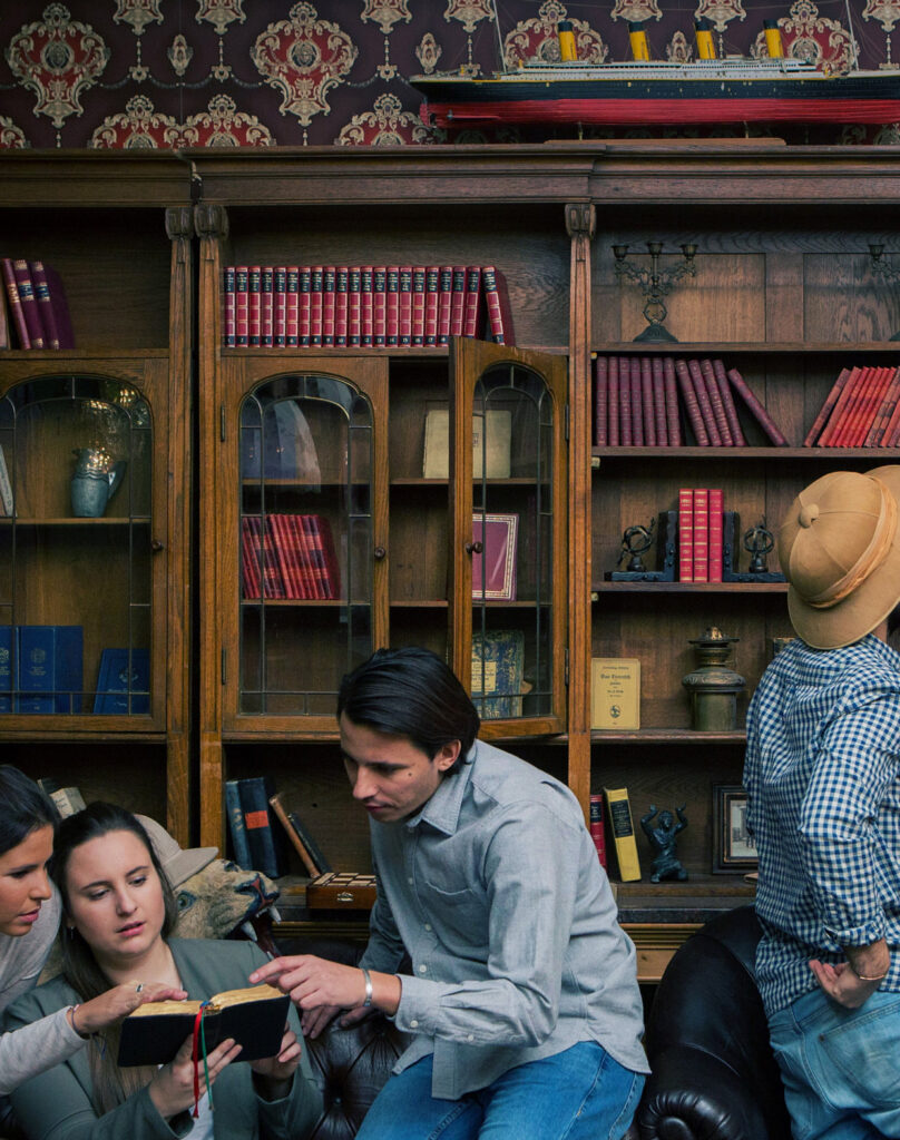 A group of people sitting on a couch.