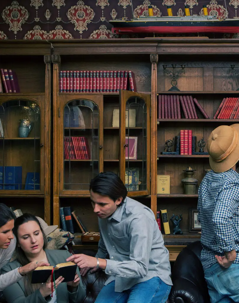 A group of people sitting on a couch.